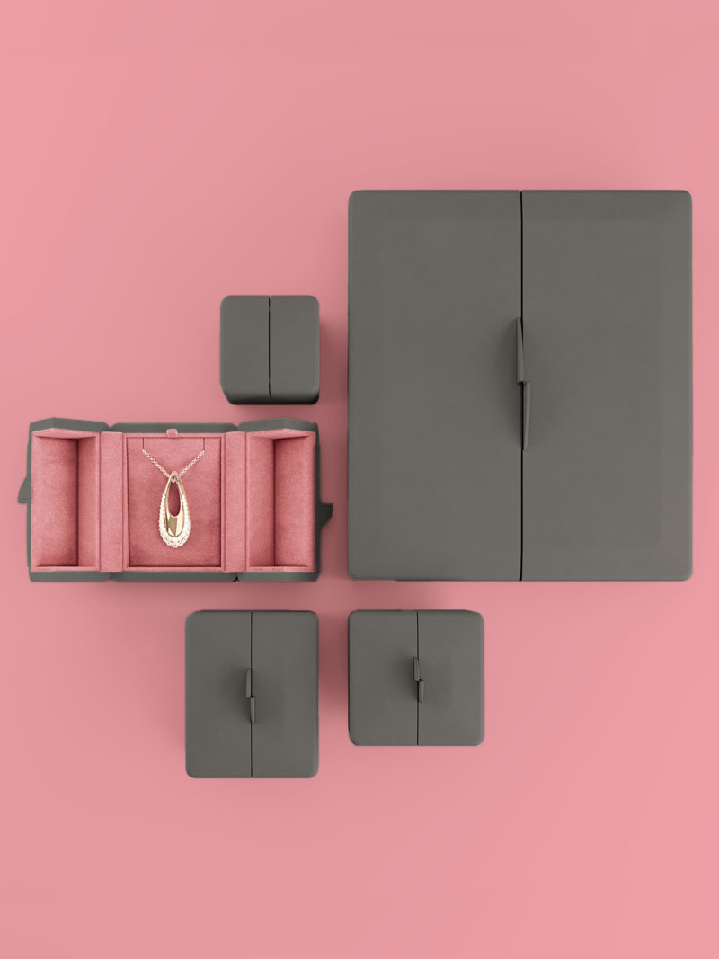 Arrangement von vier verschiedenen Fleur de Luxe Etuigrößen in Grey-Brown Rosé-Fluo geschlossen von oben